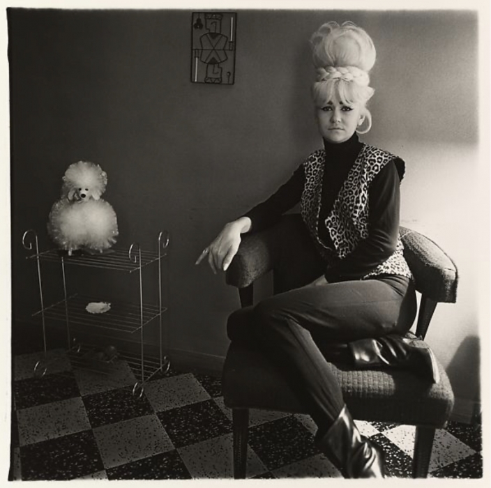 Diane Arbus, Lady Bartender at Home with a Souvenir Dog, New Orleans Diane Arbus, Lady Bartender at Home with a Souvenir Dog, New Orleans