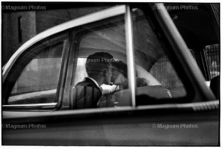 Elliott Erwitt, New York, Couple Kissing in Back of Car Elliott Erwitt, New York, Couple Kissing in Back of Car